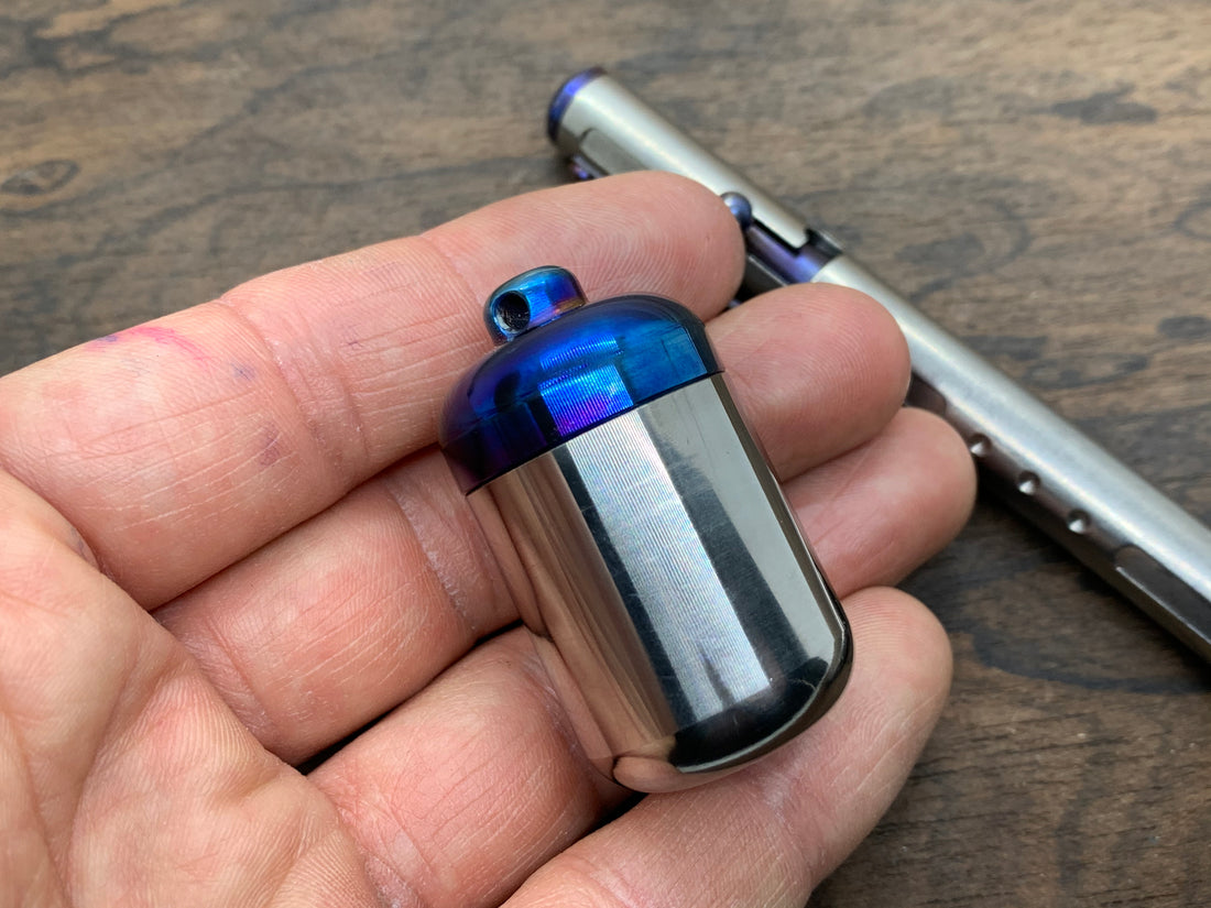 Vault 100<br>Titanium Keychain