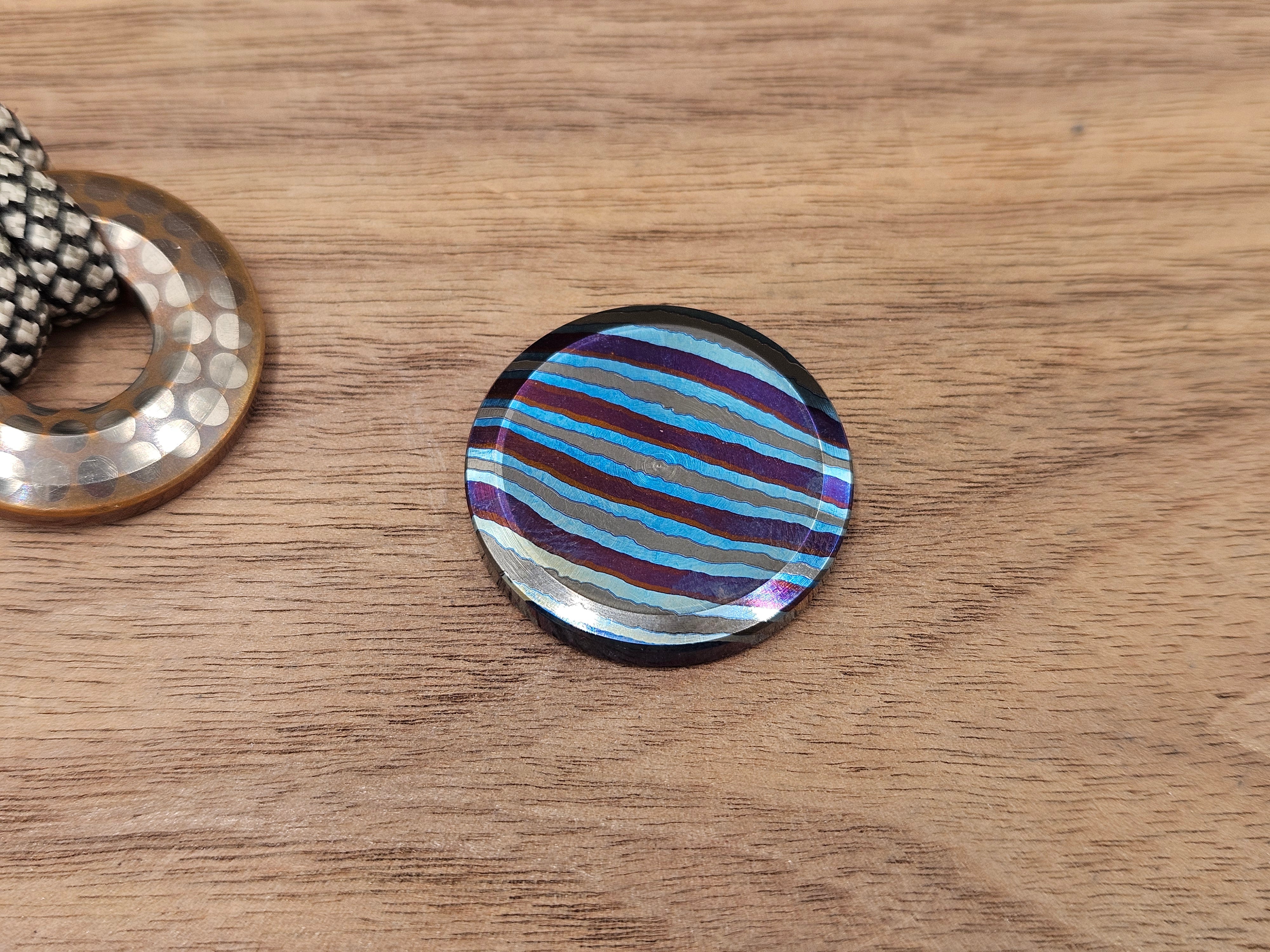The Everyday Coin 100<br>ZircuTi