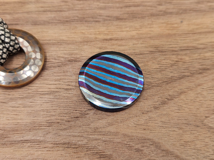 The Everyday Coin 100<br>ZircuTi