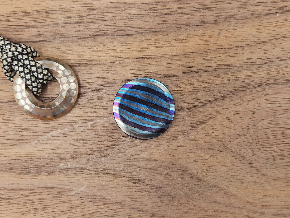 The Everyday Coin 100<br>ZircuTi