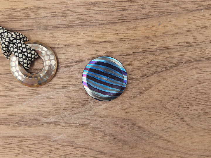 The Everyday Coin 100<br>ZircuTi