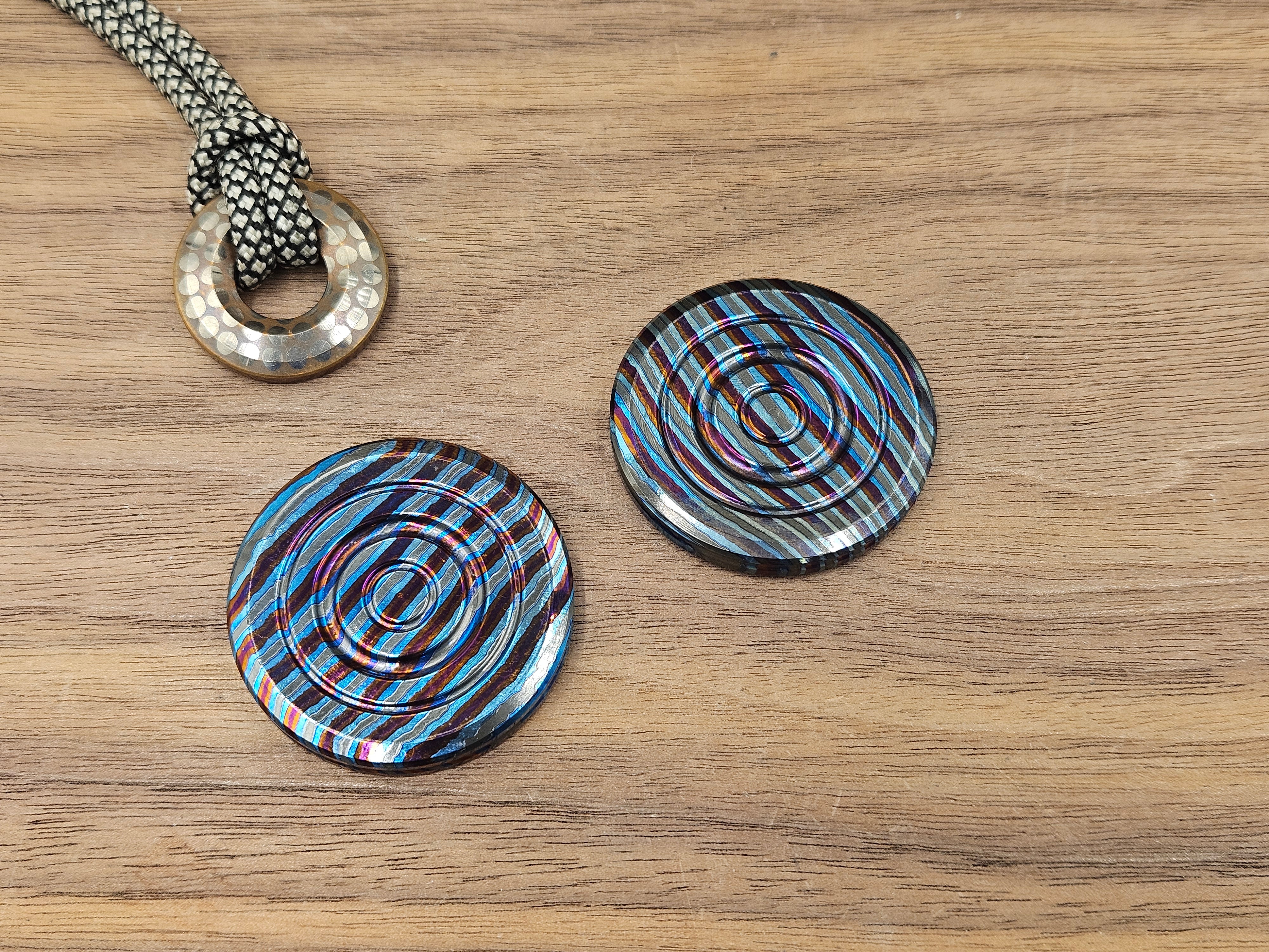 Haptic Coin ZircuTi Twist engraved Clicky