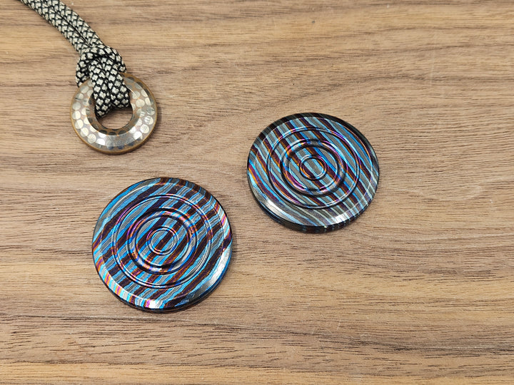 Haptic Coin ZircuTi Twist engraved Clicky