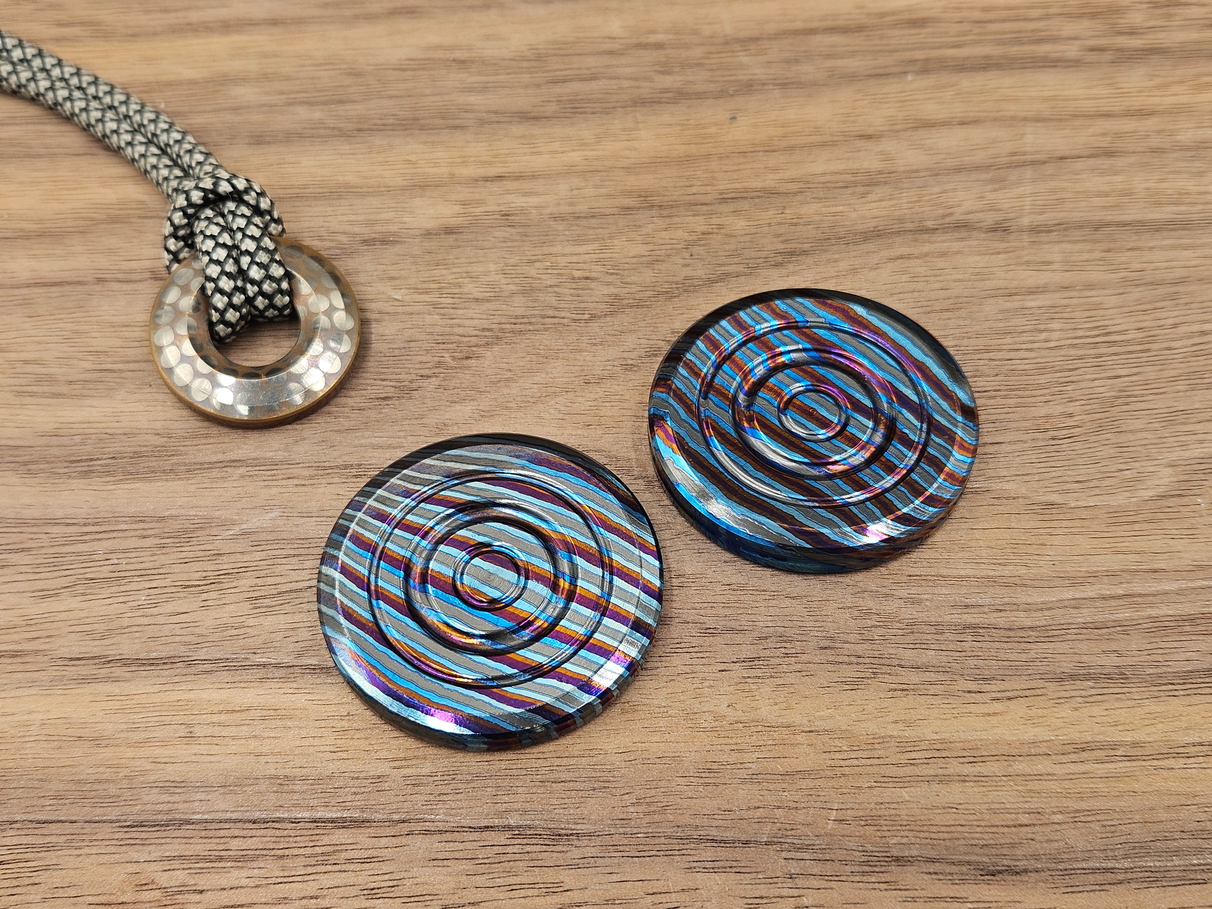 Haptic Coin ZircuTi Twist Orbiter