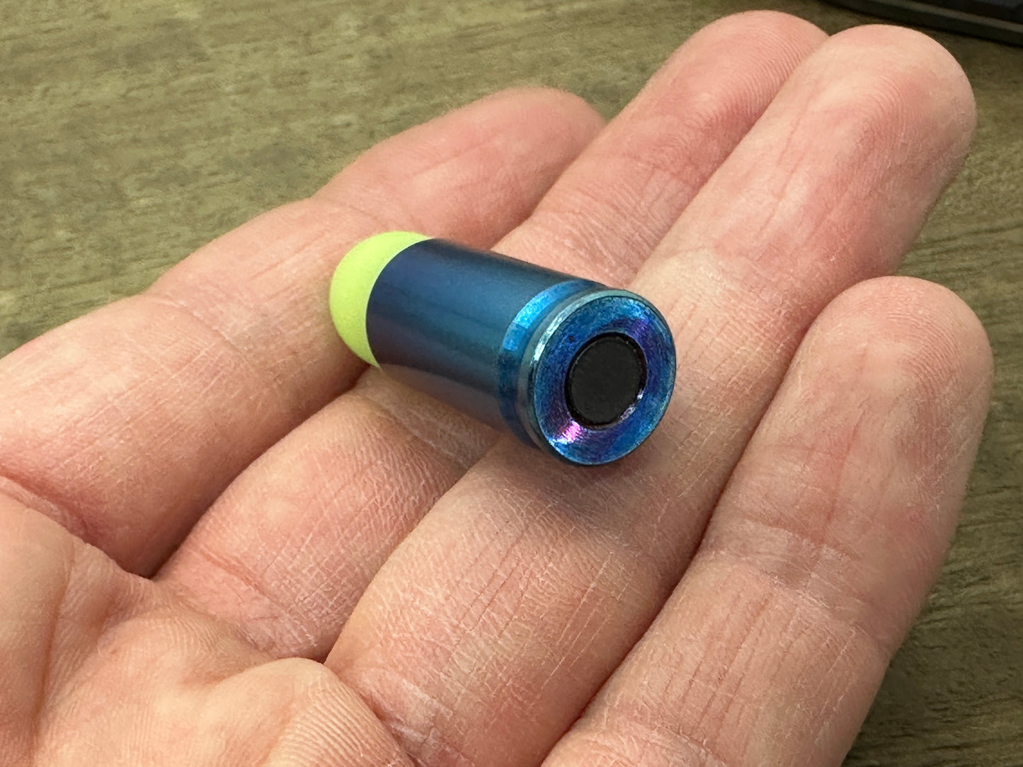 Green TurboGlow Titanium Flamed HAPTIC-BULLET Haptic Slider fidget Fridge magnet