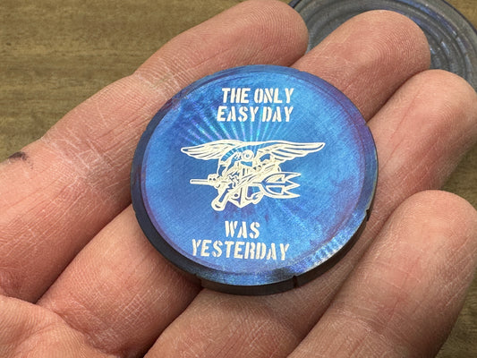 "The only easy day was yesterday.” Flamed Stainless Steel Spinning Worry Coin