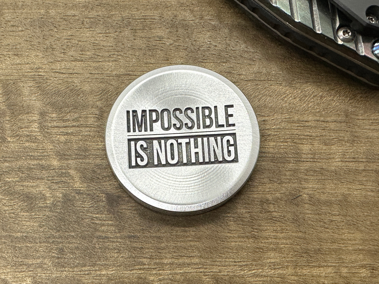 4 sizes Impossible is Nothing - Deep engraved Aluminum Worry Coin