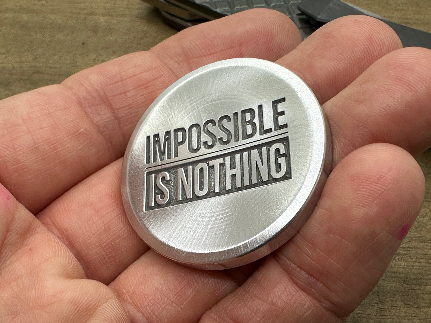 4 sizes Impossible is Nothing - Deep engraved Aluminum Worry Coin