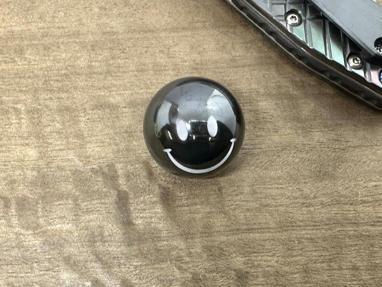 1" SMILEY Polished Solid Black Zirconium SPHERE + Glow in the dark stand