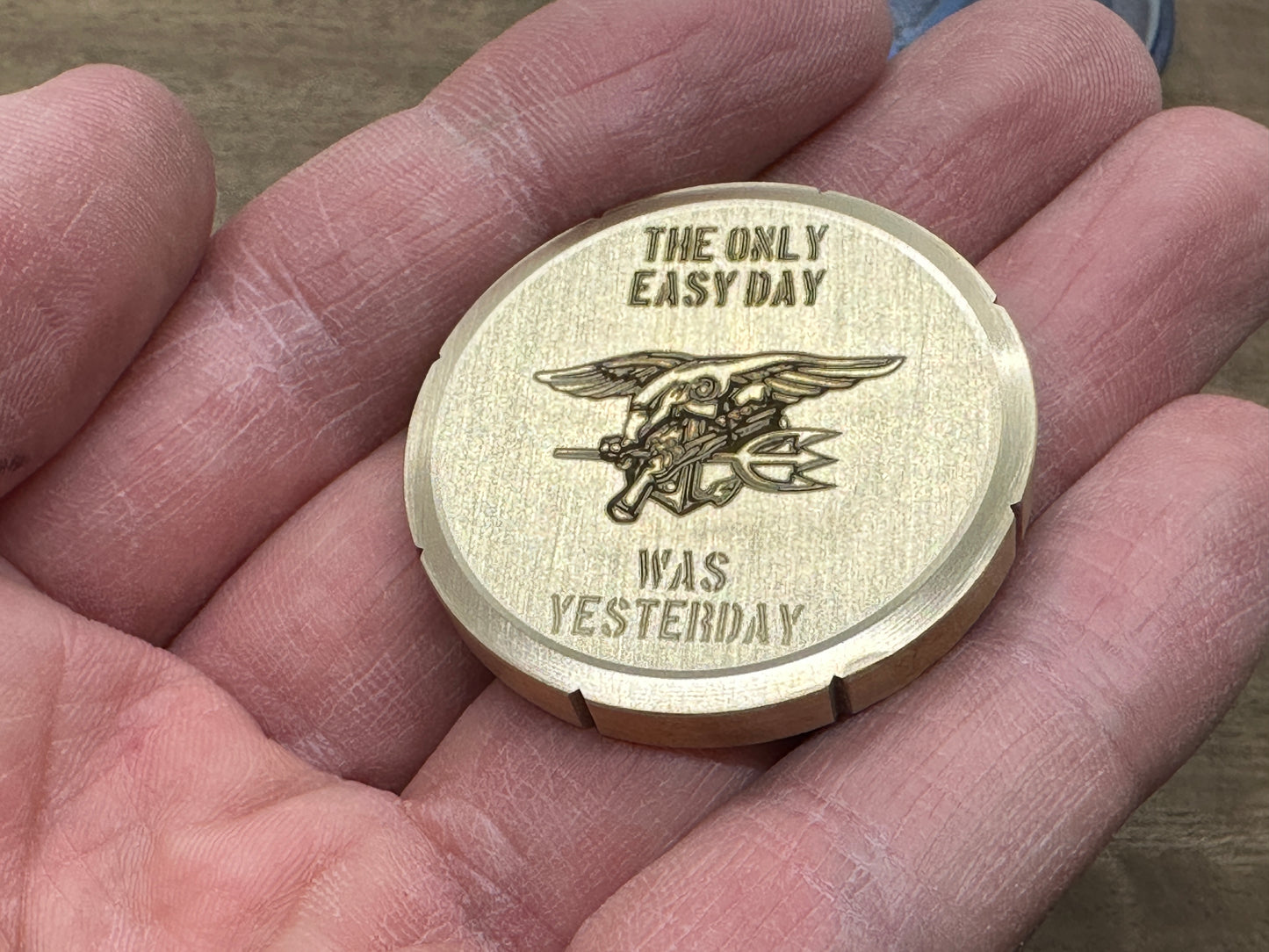 "The only easy day was yesterday.” Brass Spinning Worry Coin Spinning Top
