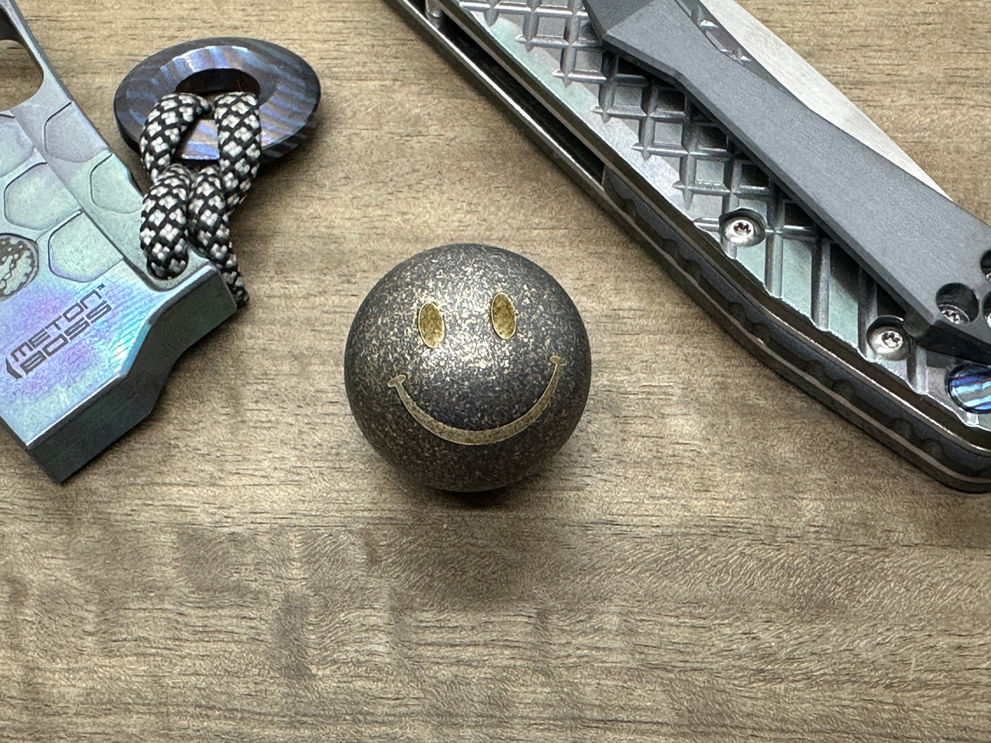 1" SMILEY Battle Worn Solid Brass SPHERE + Glow in the dark stand