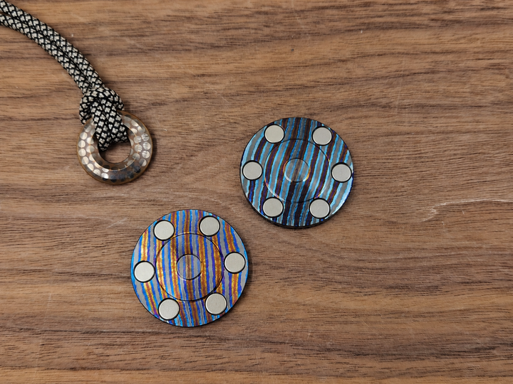 Haptic Coin ZircuTi Twist Clicky