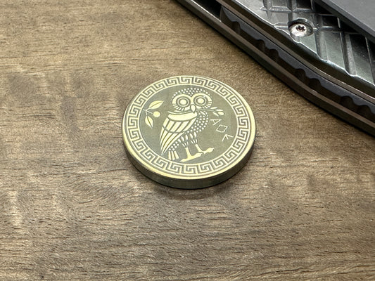 The OWL Golden ano engraved Titanium Coin for Billetspin GAMBIT