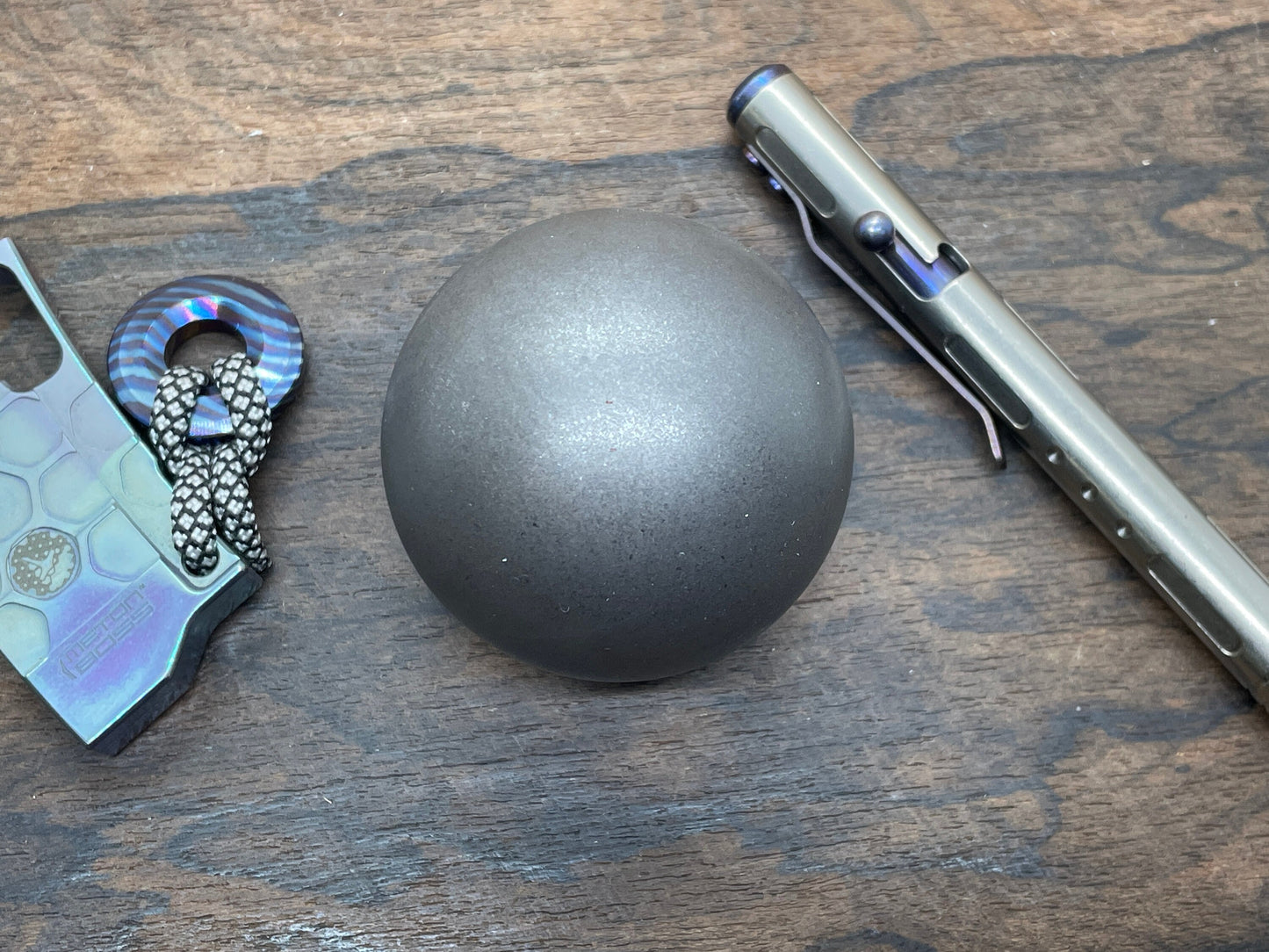 2.15" Battle Worn Solid Giga Titanium SPHERE +Glow in the dark stand